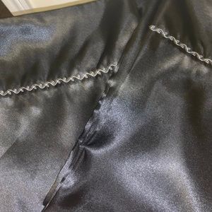 ONE black silk pillowcase